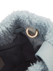 [SIGNATURE LINE] FAUX FUR BÉNÉ BUCKET BAG